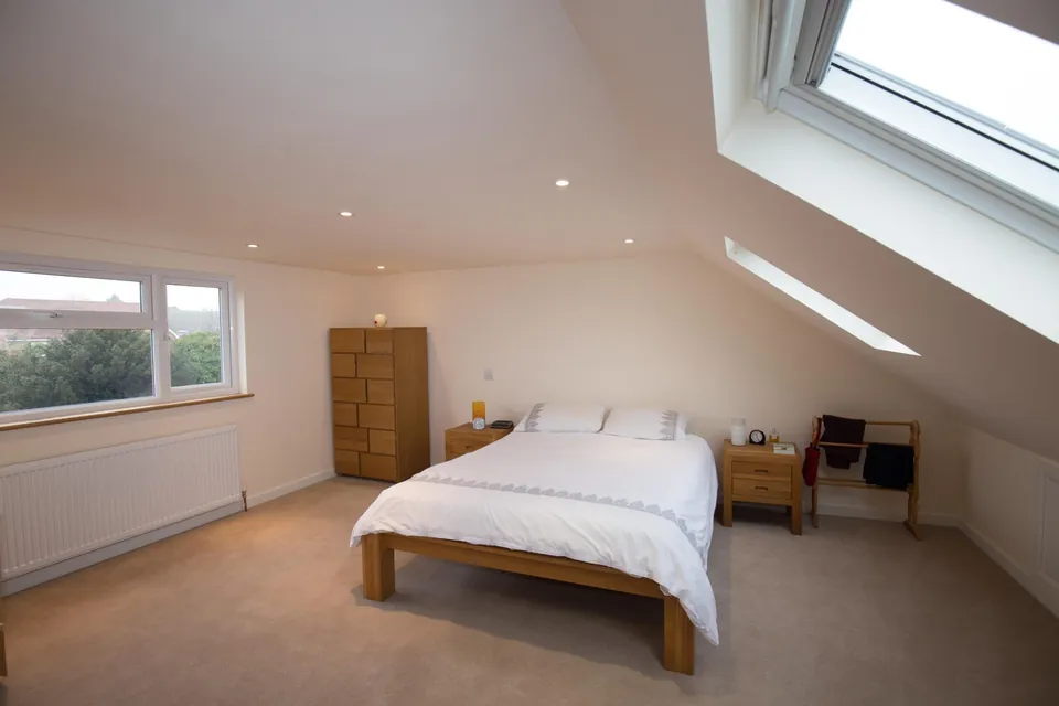 Bright loft bedroom with roof window
