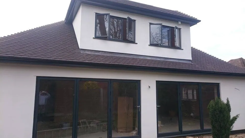 Bungalow with a new dormer level and bi-fold doors below