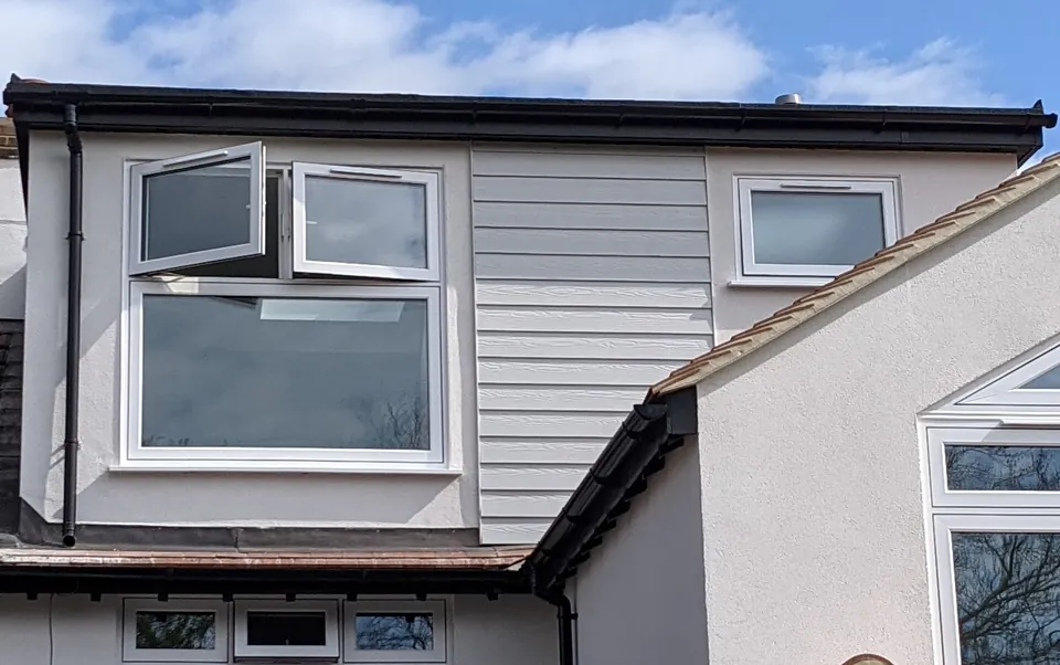 Cladded dormer with opening windows