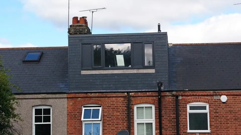 Slate dormer with roof window